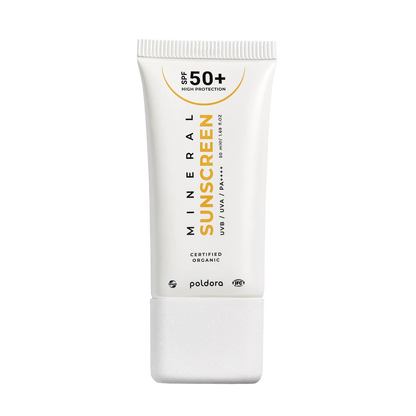Sunscreen tube with SPF 50+ on a white background