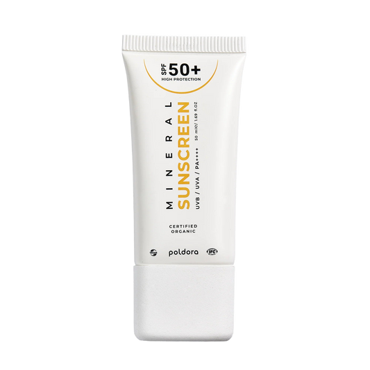 Sunscreen tube with SPF 50+ on a white background